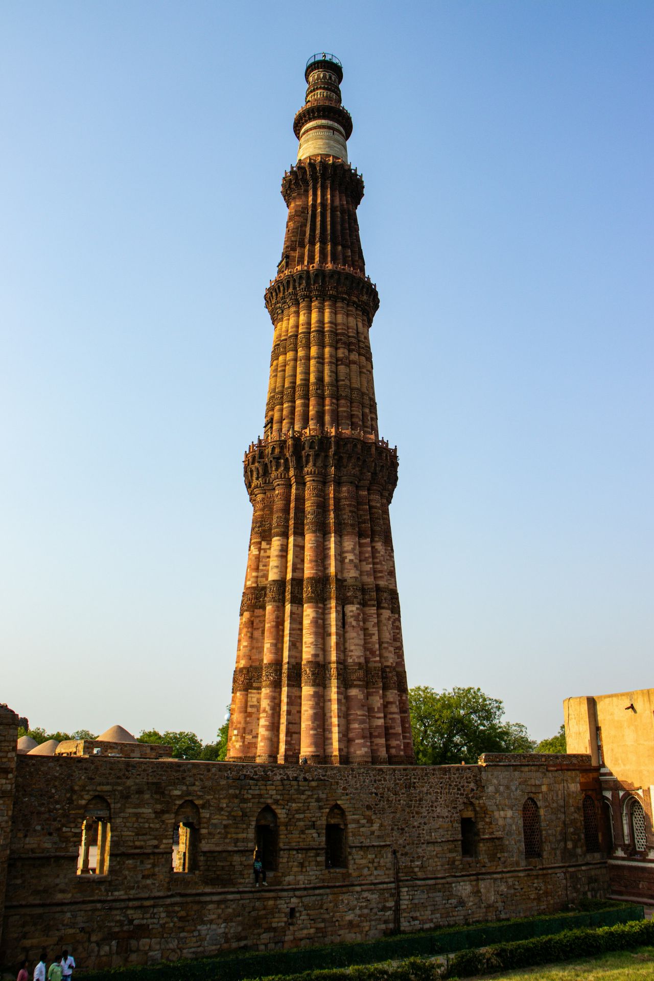 a tall tower with a clock on the top of it