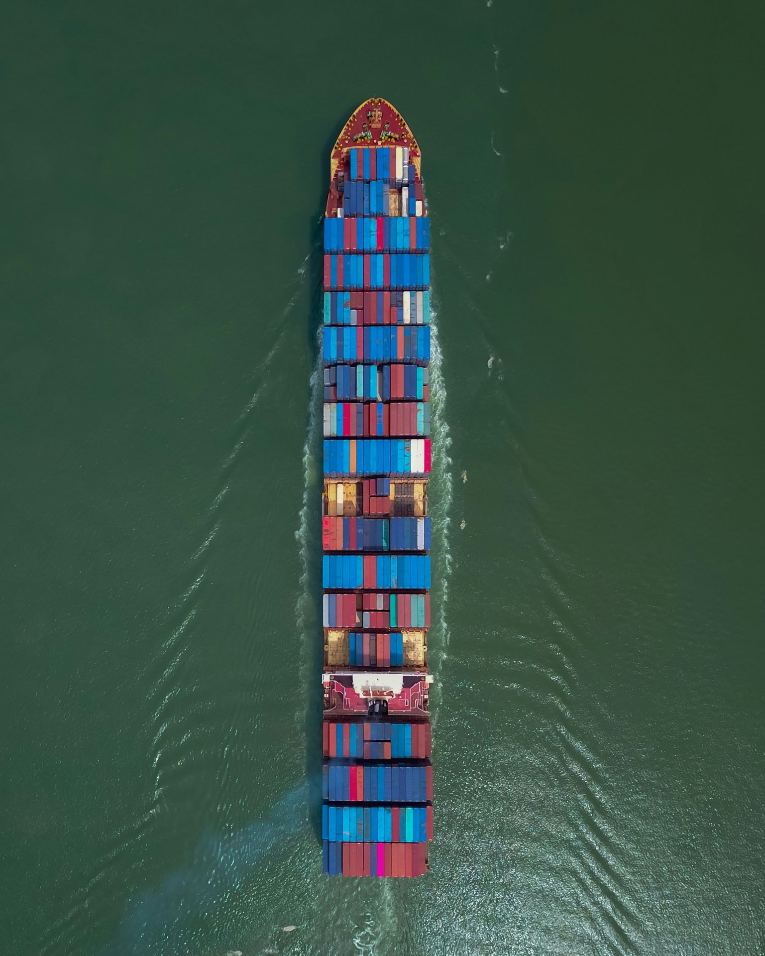 white and blue ship on sea during daytime