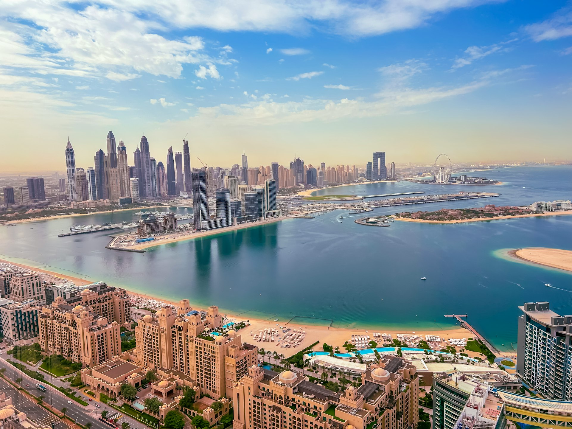 an aerial view of a city and a body of water
